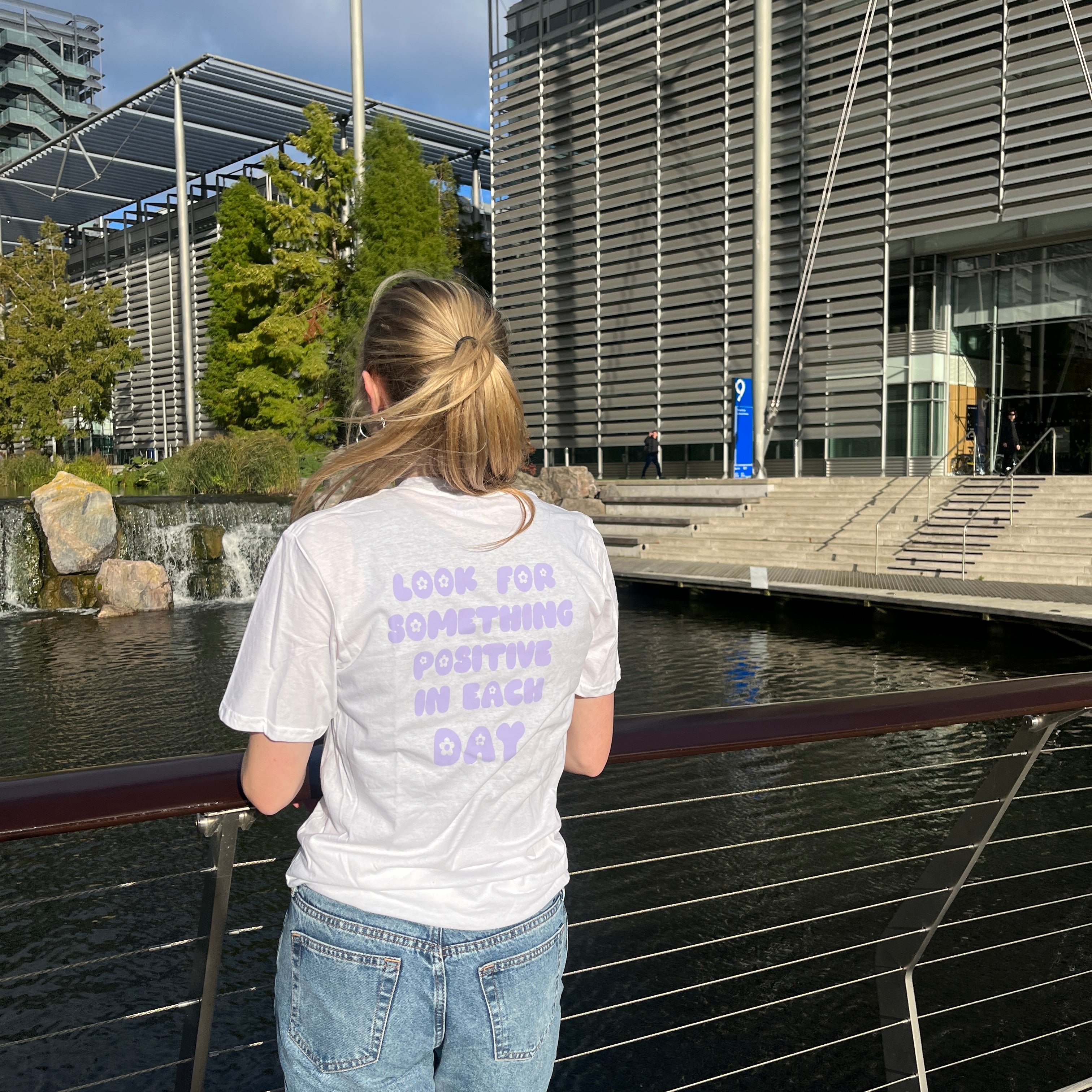 Look for something positive in each day white T-shirt with lilac text