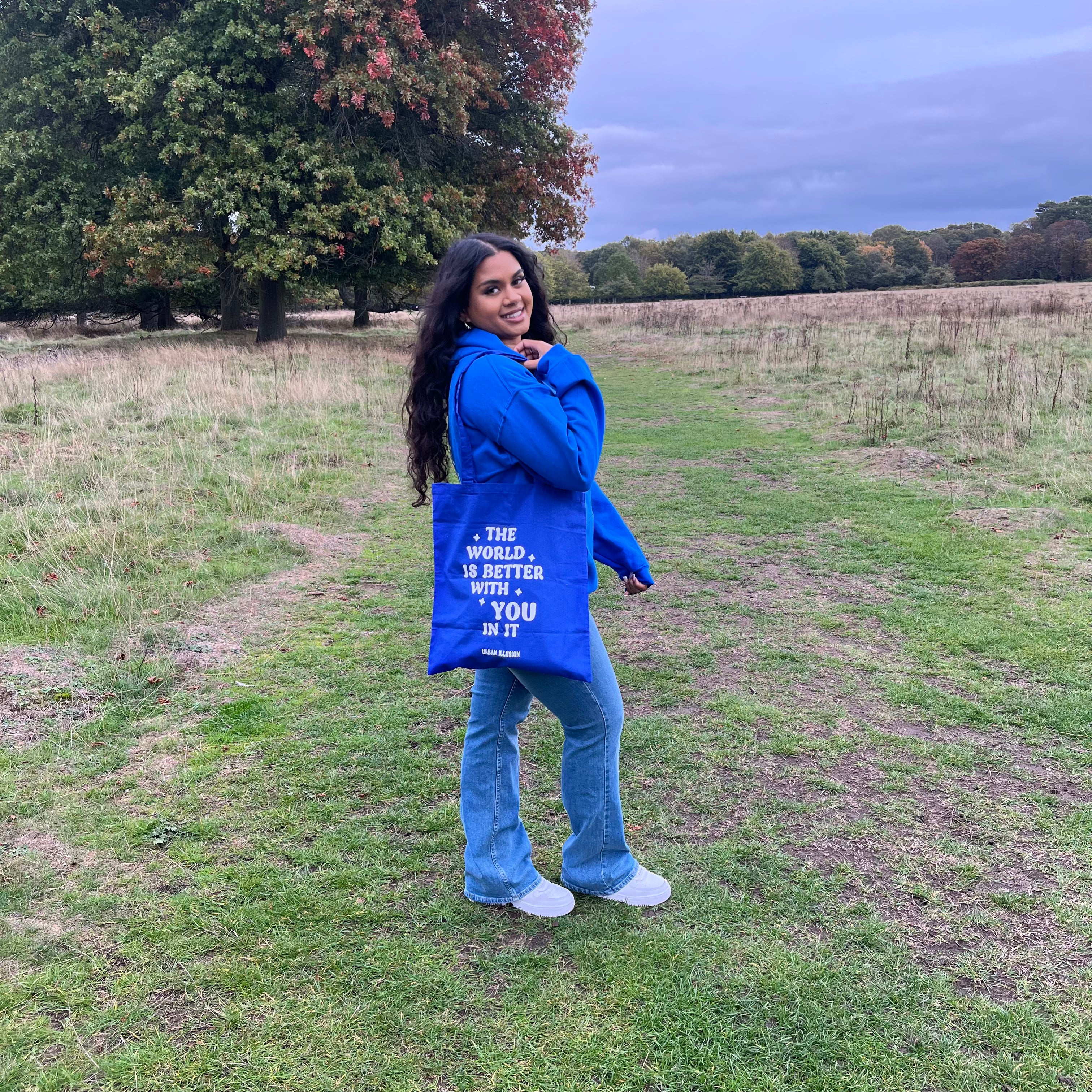 The world is better with you in it tote bag